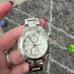 Michael Kors watch, needs new battery. Loved condition.